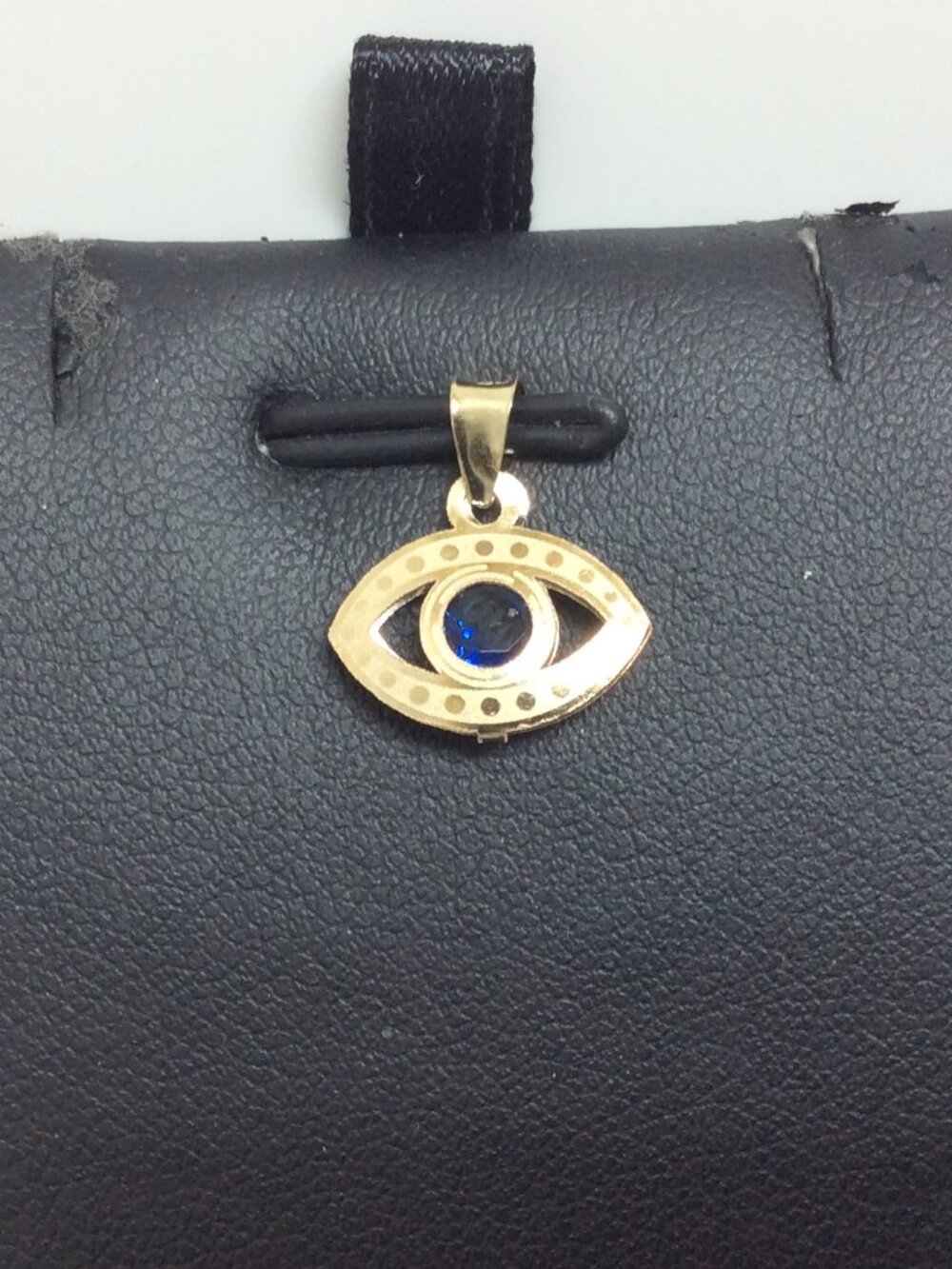 10k  yellow  Real Gold EVIL EYE pendant with Blue stone charm .40grams